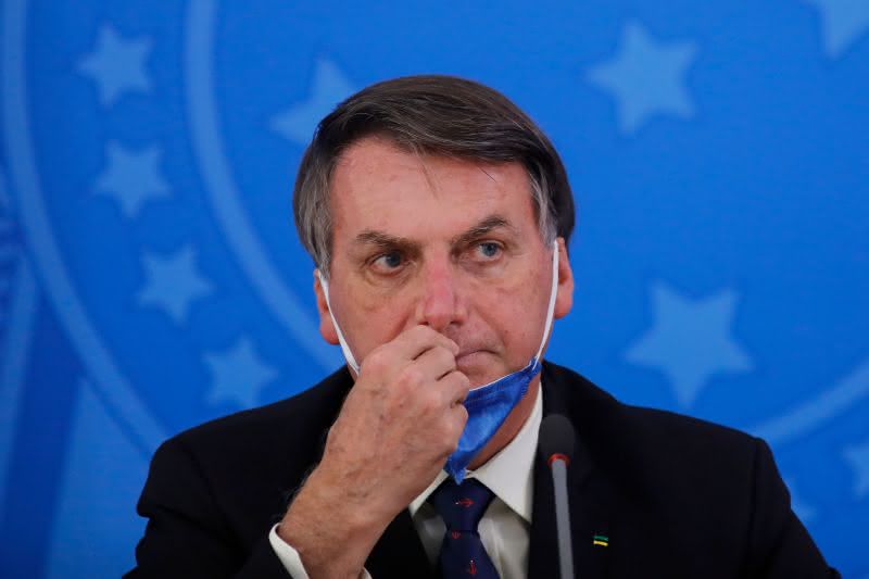 Bolsonaro ignora 2ª onda de Covid-19 no Brasil: 'Estamos vivendo um finalzinho de pandemia' (Imagem: Sergio Lima / AFP - Getty Images)